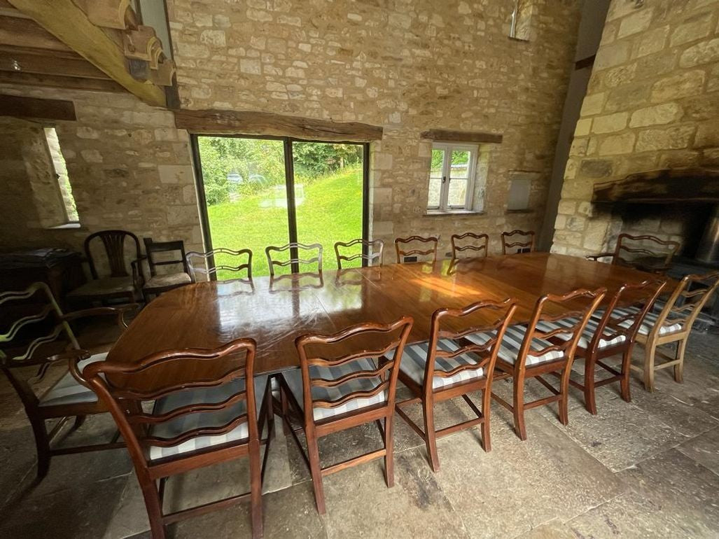 Set of Fourteen (12+2) Dining Chairs in the Manner of Thomas Chippendale