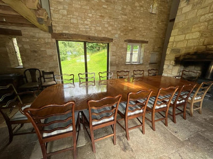 Set of Fourteen (12+2) Dining Chairs in the Manner of Thomas Chippendale