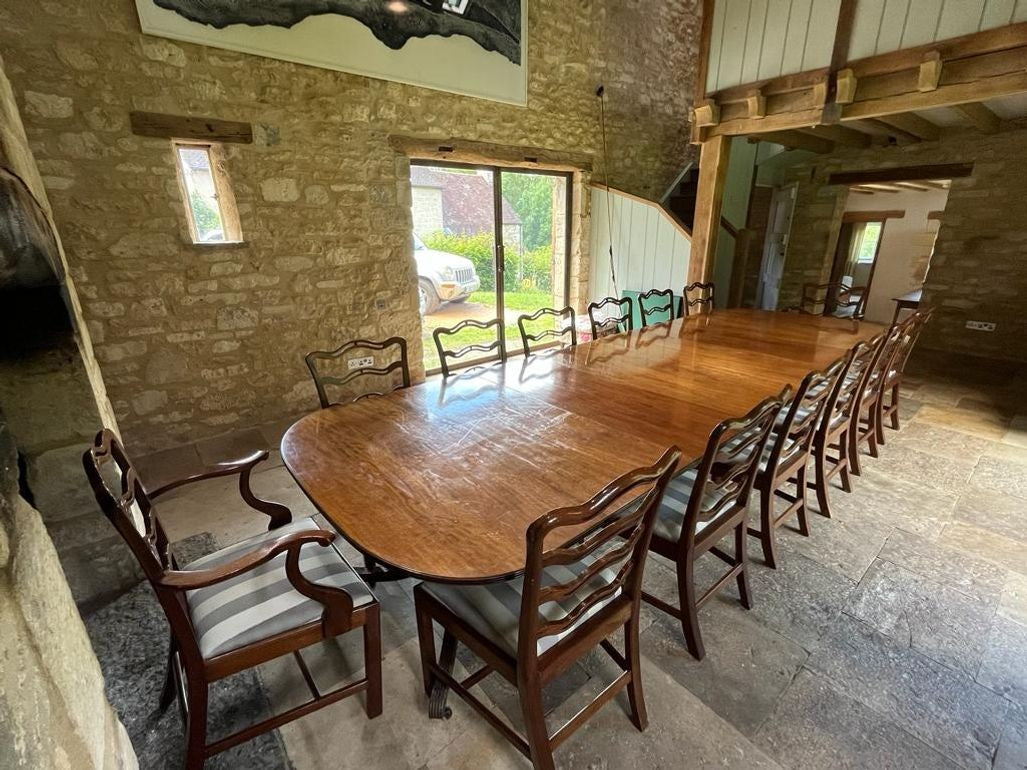 Set of Fourteen (12+2) Dining Chairs in the Manner of Thomas Chippendale