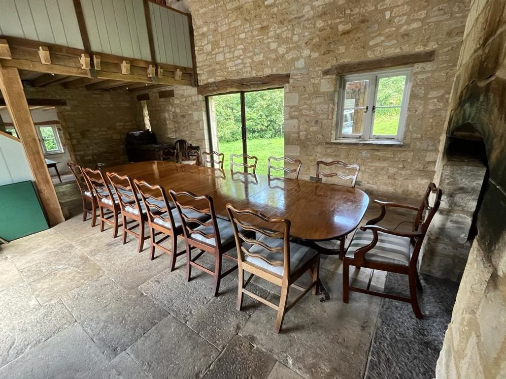 Set of Fourteen (12+2) Dining Chairs in the Manner of Thomas Chippendale