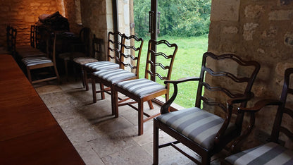 Set of Fourteen (12+2) Dining Chairs in the Manner of Thomas Chippendale